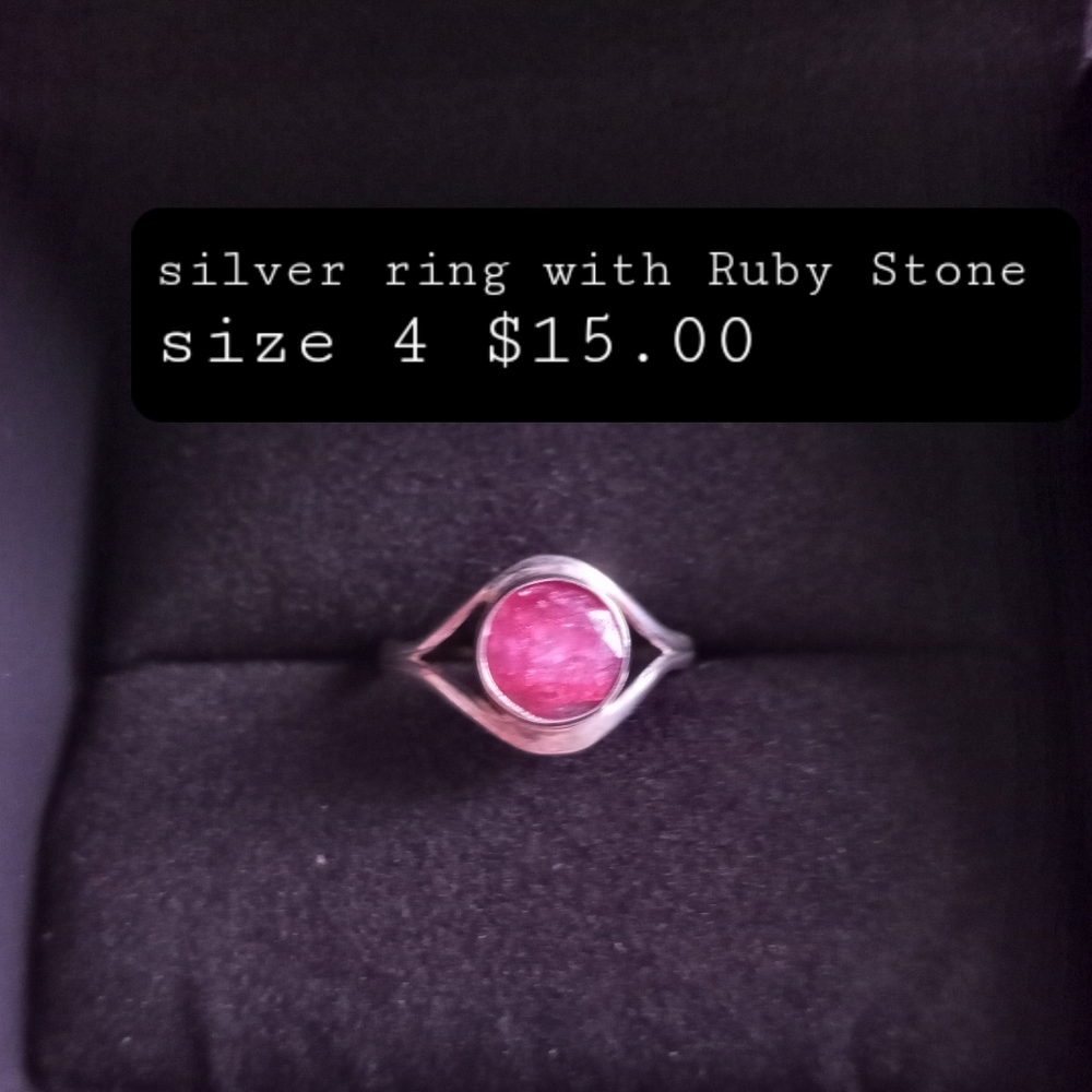 Ring with Ruby crystal.